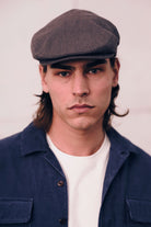 Unisex Hooligan Flat Cap in the color Indigo/Dark Sand - Men's Front View