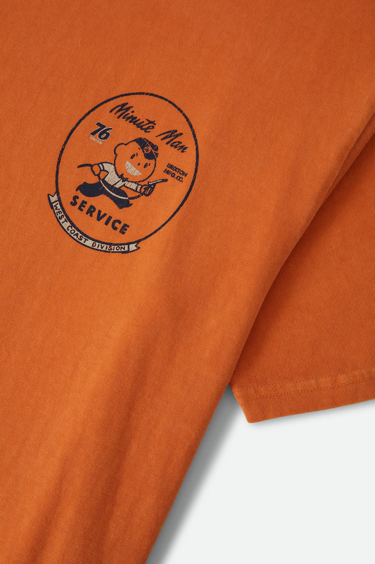 Men's 76 Minute Man Standard T-Shirt in the color Washed Orange - Additional Laydown image