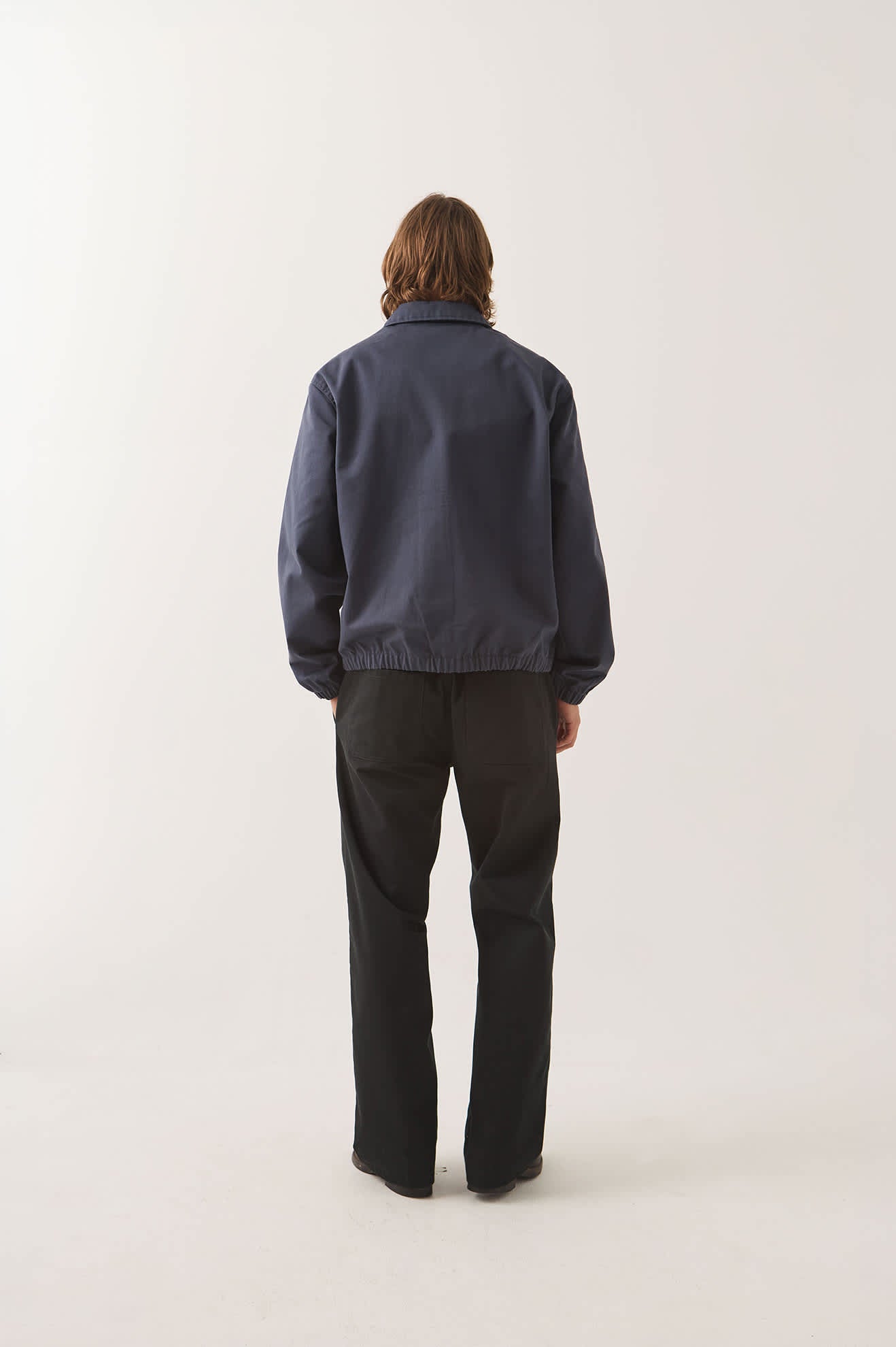 Men's Trademark Lightweight Garage Zip Jacket in the color Washed Navy - Men's Back View