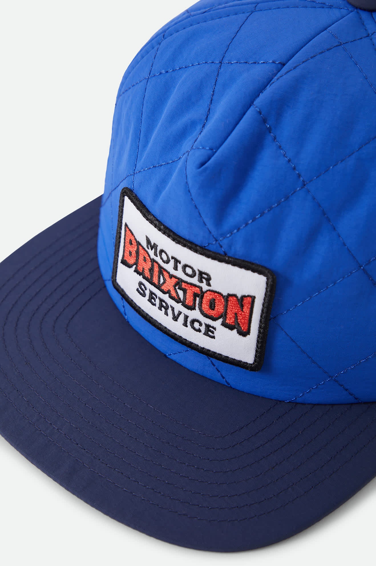 Unisex Motorized Snapback in the color Electric Indigo/Washed Navy - Additional Laydown image