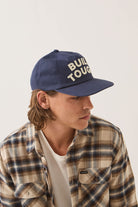 Unisex Ford Built Tough Snapback in the color American Navy/Wimbledon White - Men's Side View