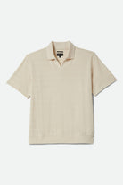 Men's Theo Jacquard Short Sleeve Polo in the color Cream - Front Product View