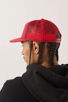 Unisex Ford 4x4 Chrome Trucker Hat in the color Rangoon Red - Men's Back View